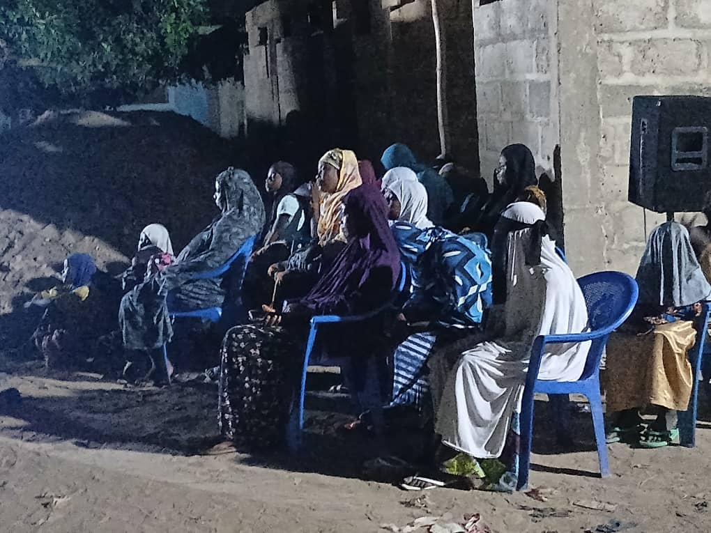 Another view of a night dawa gathering in a village